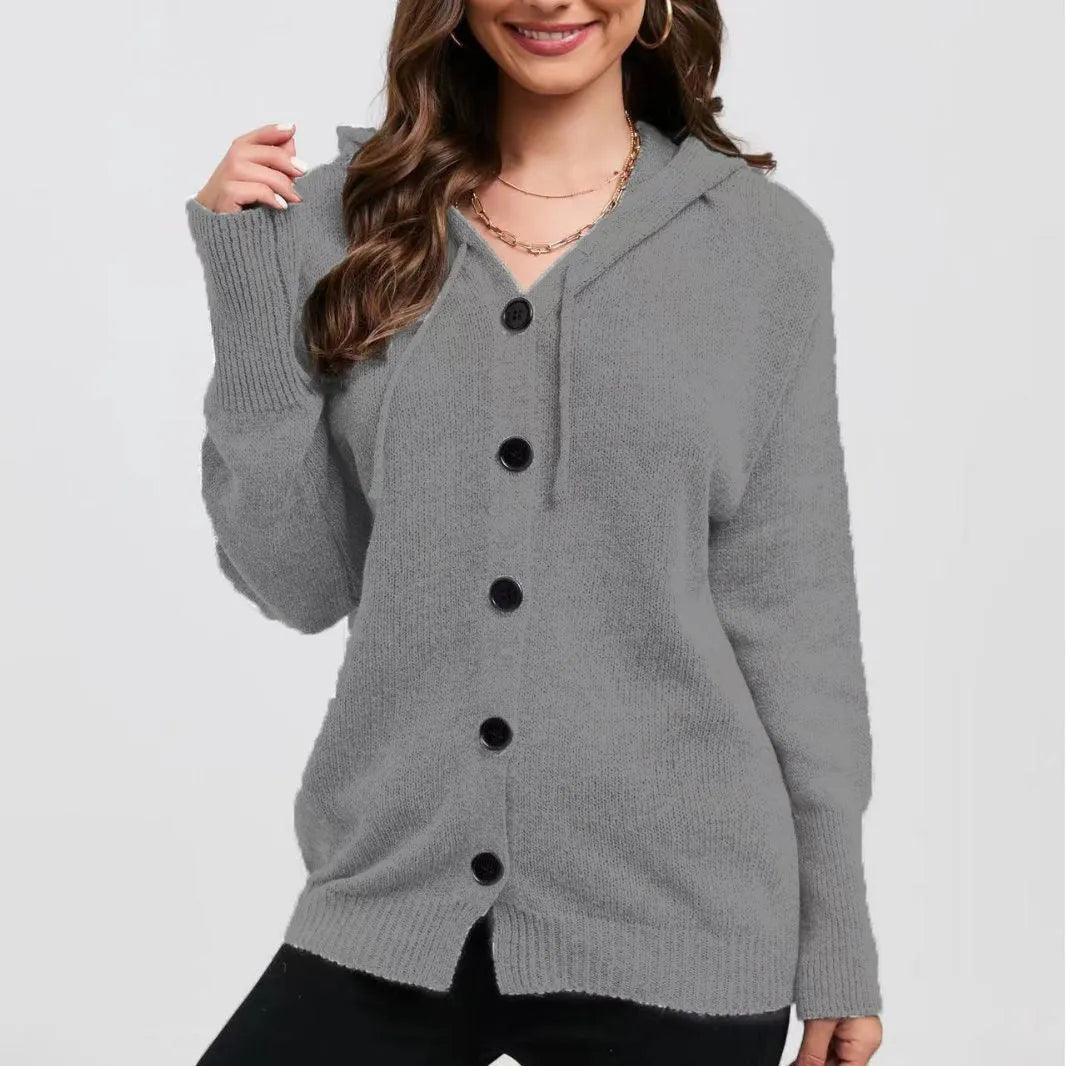 Women's solid colour hooded cardigan in thick cotton fabric showing loose fit and long sleeves