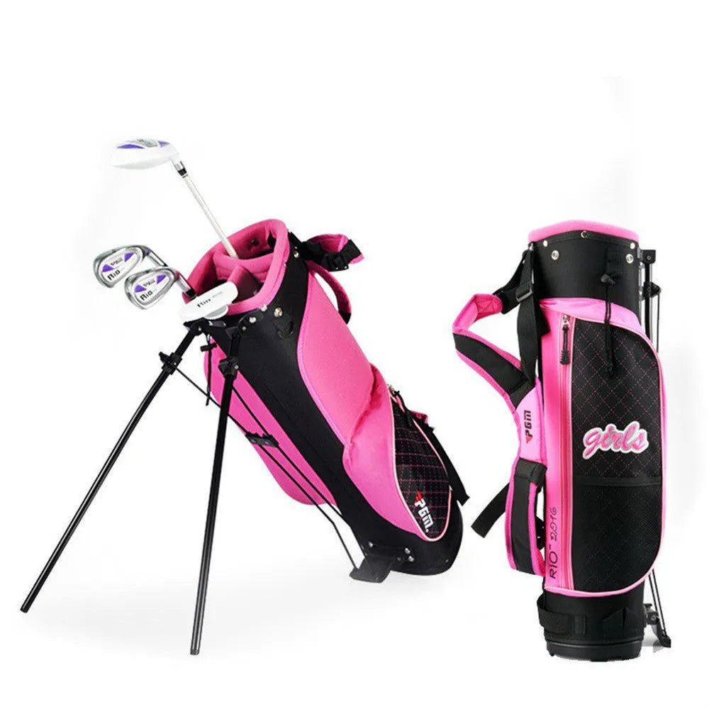 Children's golf club set featuring a forged aluminium driver, two iron poles, a putter, and a ball bag on a grassy field