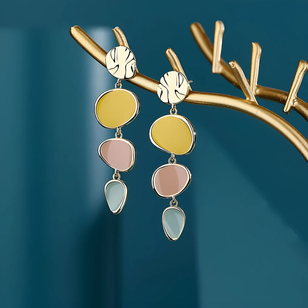 Morandi three-colour oil drip finish on disc-shaped alloy earrings with sterling silver post.