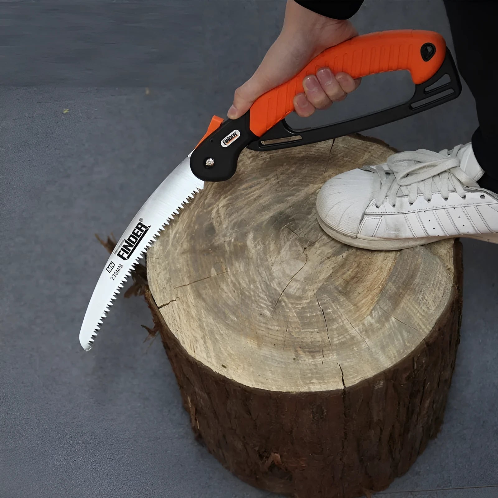 A closed and open view of a folding hand saw with a black TPR grip and a silver 65MN steel blade.