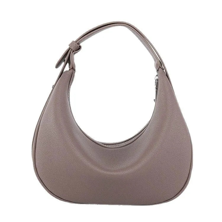 Crescent-shaped PU hobos handbag with sewing line detailing and internal zipper changing bag and mobile phone pocket