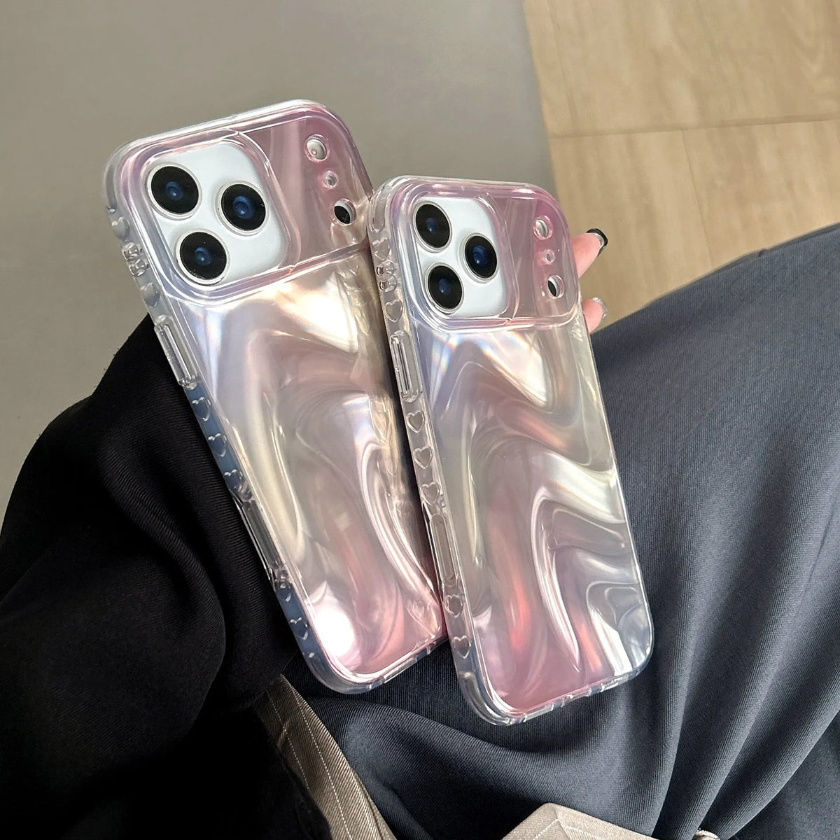 Double shell iPhone case in IMD silver pink satin pattern with water ripple smudge design