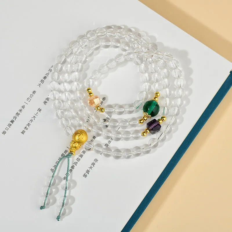 White crystal 108 bead rosary bracelet with geometric ethnic design