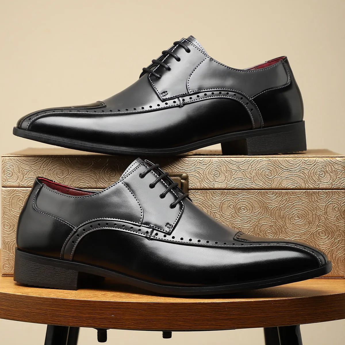 Men's black low-top casual shoes with a PU leather upper, leather toe cap, and visible stitching detail on a white background.