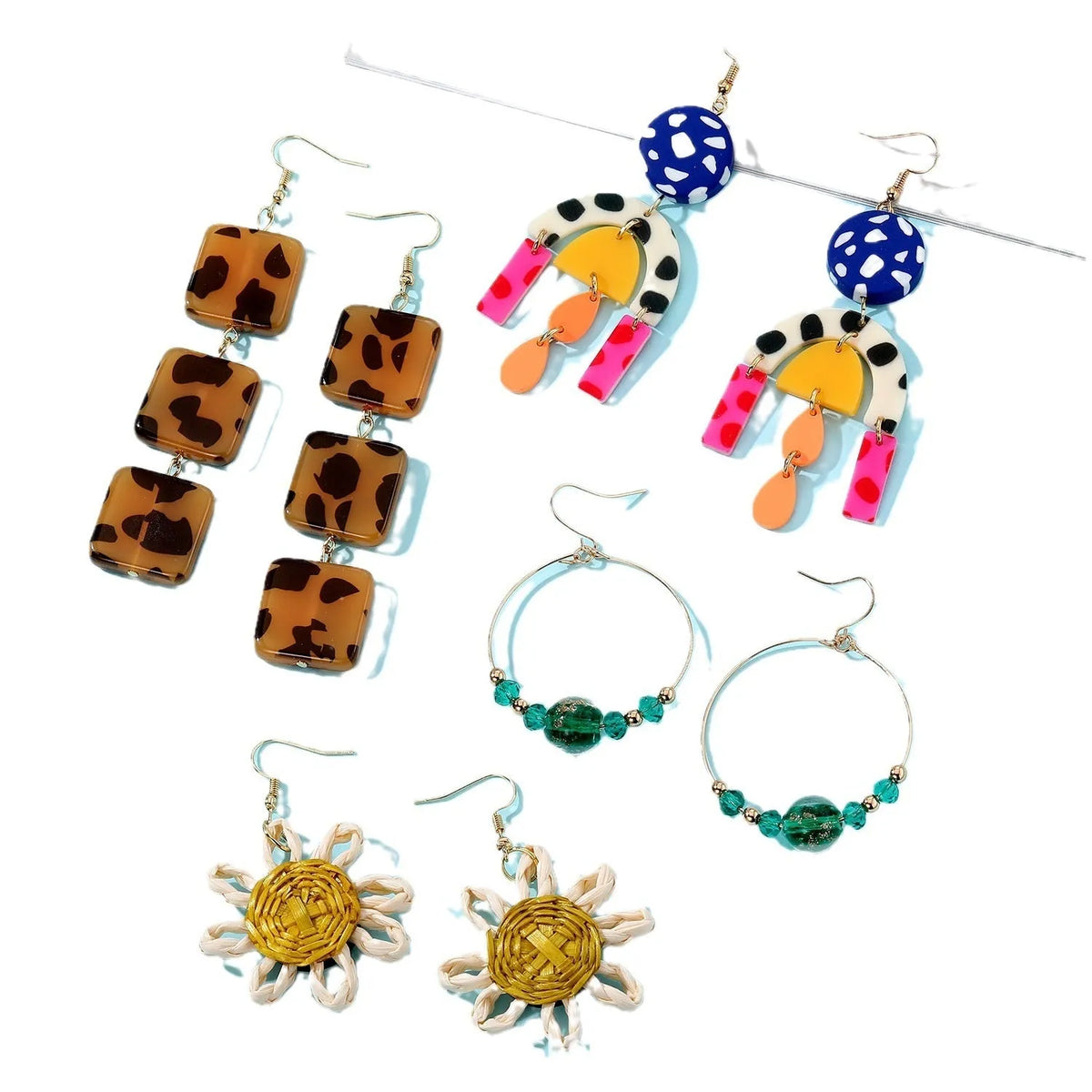 Set of three women's geometric square ear studs with leopard print, sunflower, and coloured glaze bead designs on plastic resin material