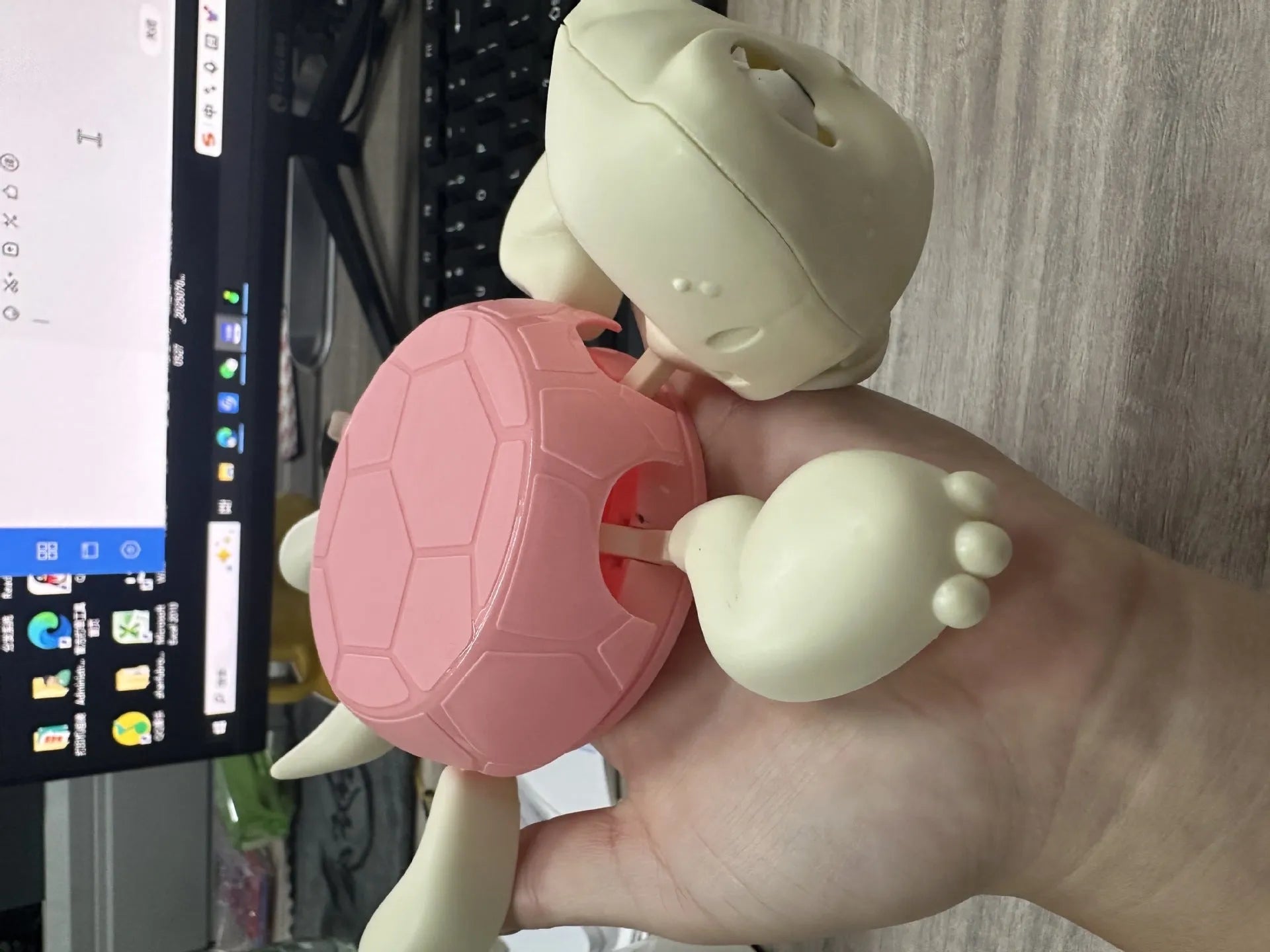 Turtle-shaped ABS plastic coaster in light green colour for heat insulation under drinks
