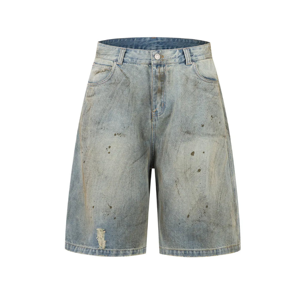 Blue cropped denim trousers with a straight leg and zip fly on a hanger