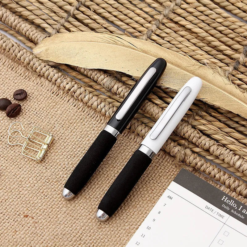Compact silver and black ballpoint pen with a 1.0mm metal tip and a textured EVA cap.