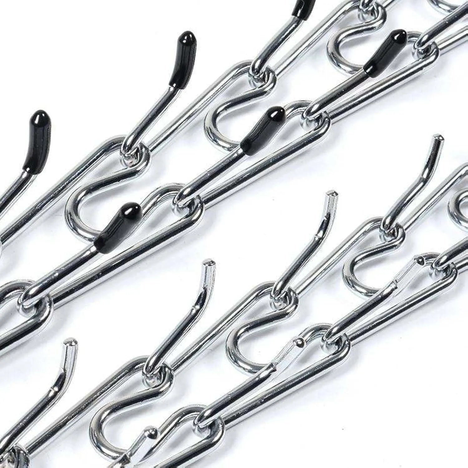 Stainless steel adjustable dog prong training collar with rubber comfort tips on a grey background.