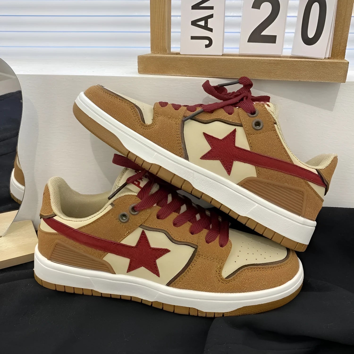 Brown women's platform sneakers with sequin accents and rubber soles