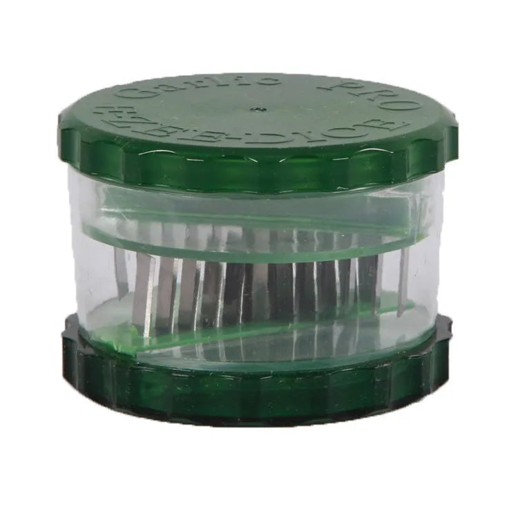 Green transparent garlic peeler kitchen gadget measuring 8.5cm by 8.5cm by 6cm