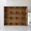 Square solid wood cup storage rack with multiple grid compartments in birch wood meridian colour