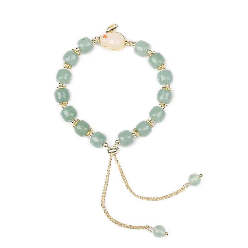 Adjustable rabbit charm bracelet with green aventurine or strawberry quartz stone beads and gold accents