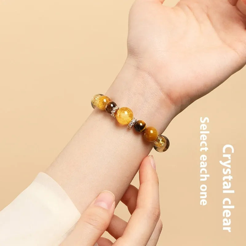Crystal tiger-eye bracelet with yellow tower design showing 10mm geometric beads