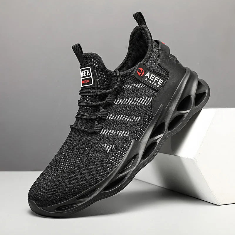 Men's casual running shoes with mesh upper in black colour showing cross strap details and low-top design