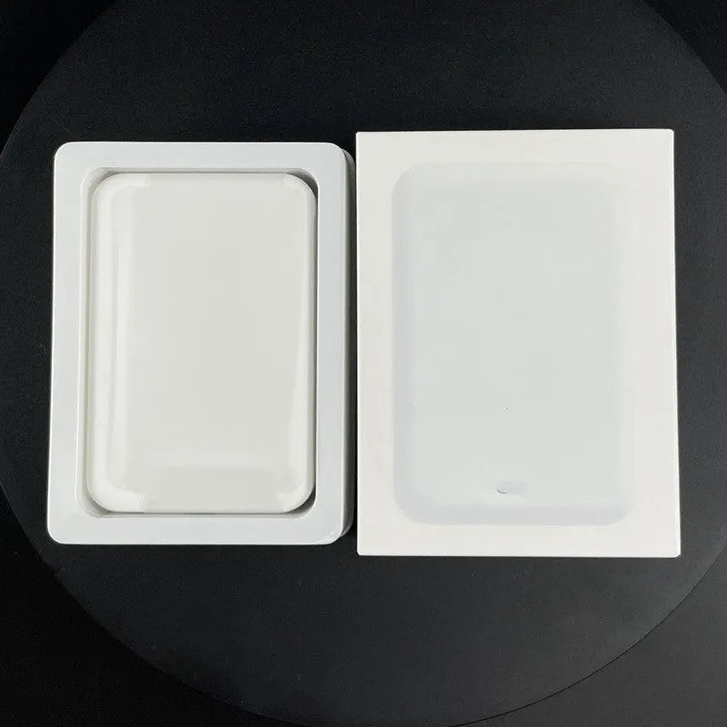 Compact magnetic wireless power bank with 5000mAh capacity in white PVC housing