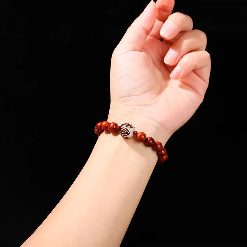 Red rosewood and gray jade Bodhi Lotus bracelet with geometric round beads.