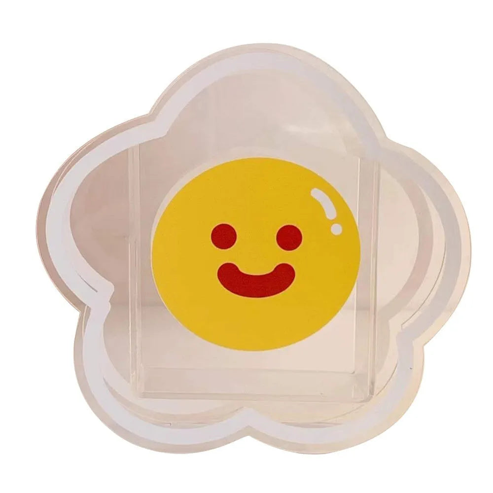 Clear square acrylic storage box with a cute cartoon rabbit design, sitting on a wooden desk.