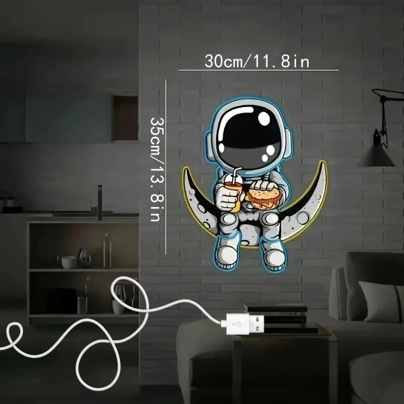Blue and yellow astronaut-shaped neon light sign mounted on a wall