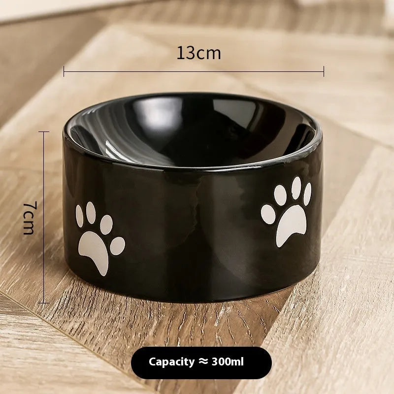 Ceramic cat bowl with high-footed design showing cat's paw decoration pattern in selected colour