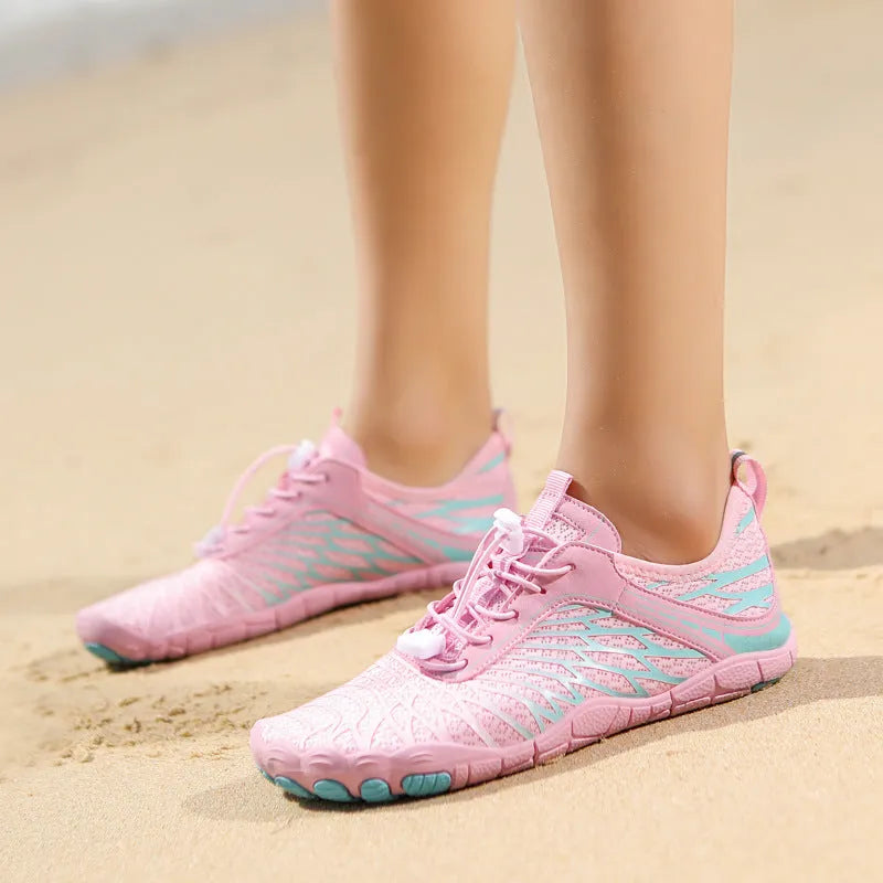 Unisex water shoes with non-slip rubber sole and Velcro closure in black and blue colour option