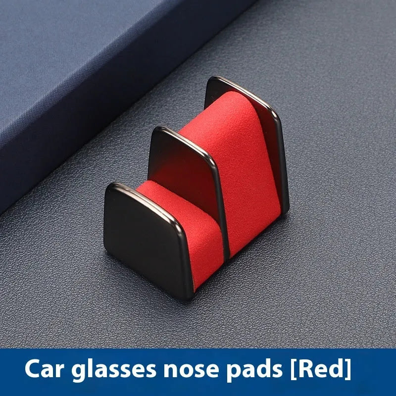 Zinc alloy and leather glasses clip for car dashboard in choice of colours.