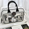 One-shoulder crossbody bag in PU, 42x24cm, white or black, with zipper change bag and outer pocket.