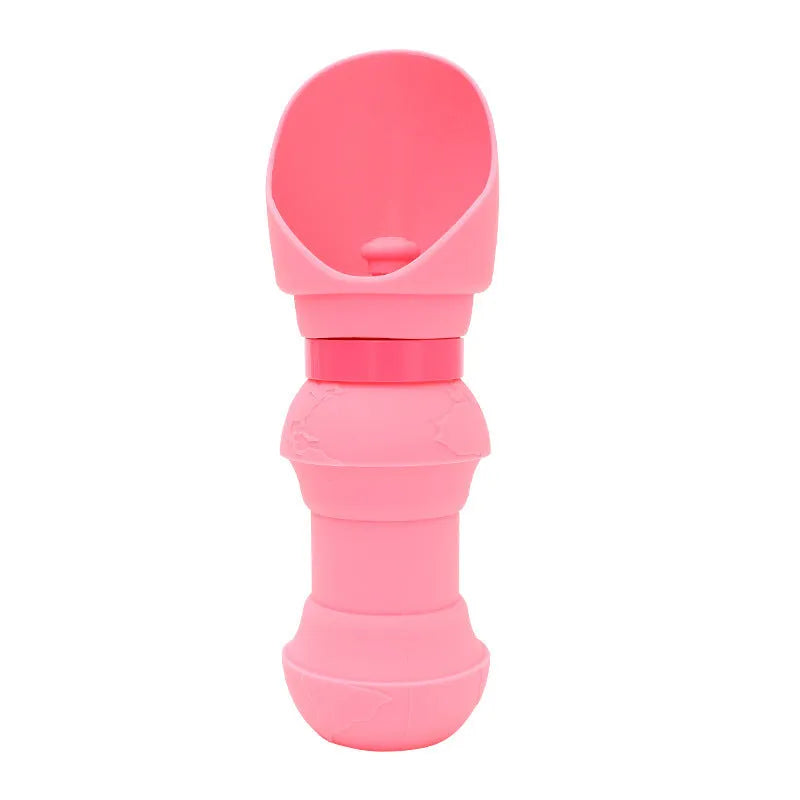 Silicone pet folding cup shown in assorted colours including black, pink, and blue, collapsed flat and expanded for use.