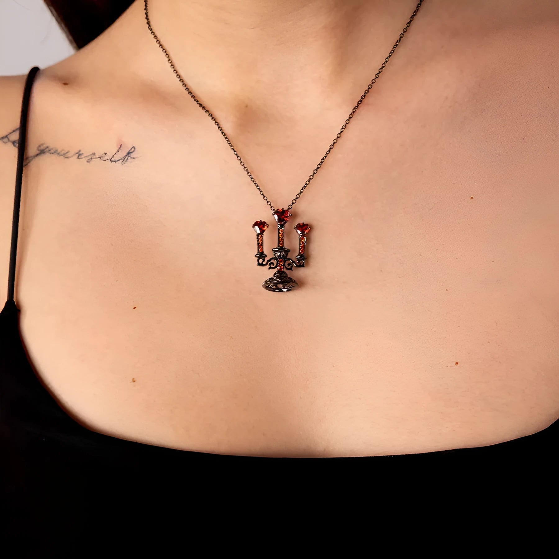 Gothic women's clavicle chain necklace with hollow retro candlestick zinc alloy pendant on a cross chain.