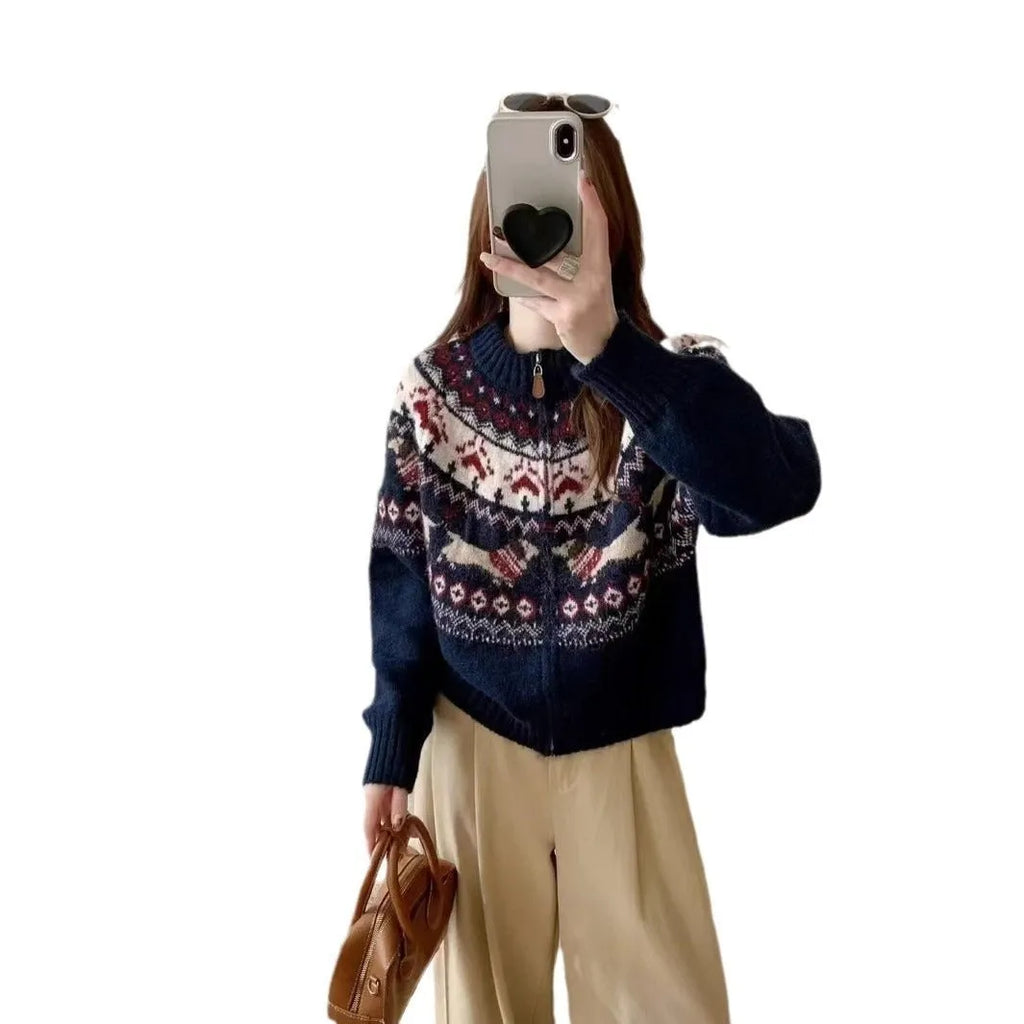 Ethnic patterned heavy industry jacquard pullover sweater in apricot colour, showing 3D texture and loose fit.