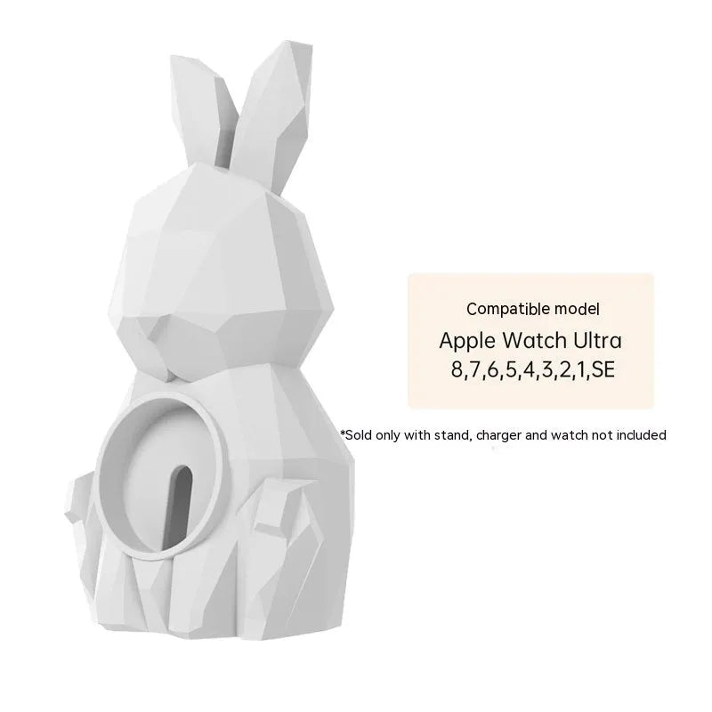 Rabbit-shaped silicone desk charger bracket in white with wrist strap holding a charging cable