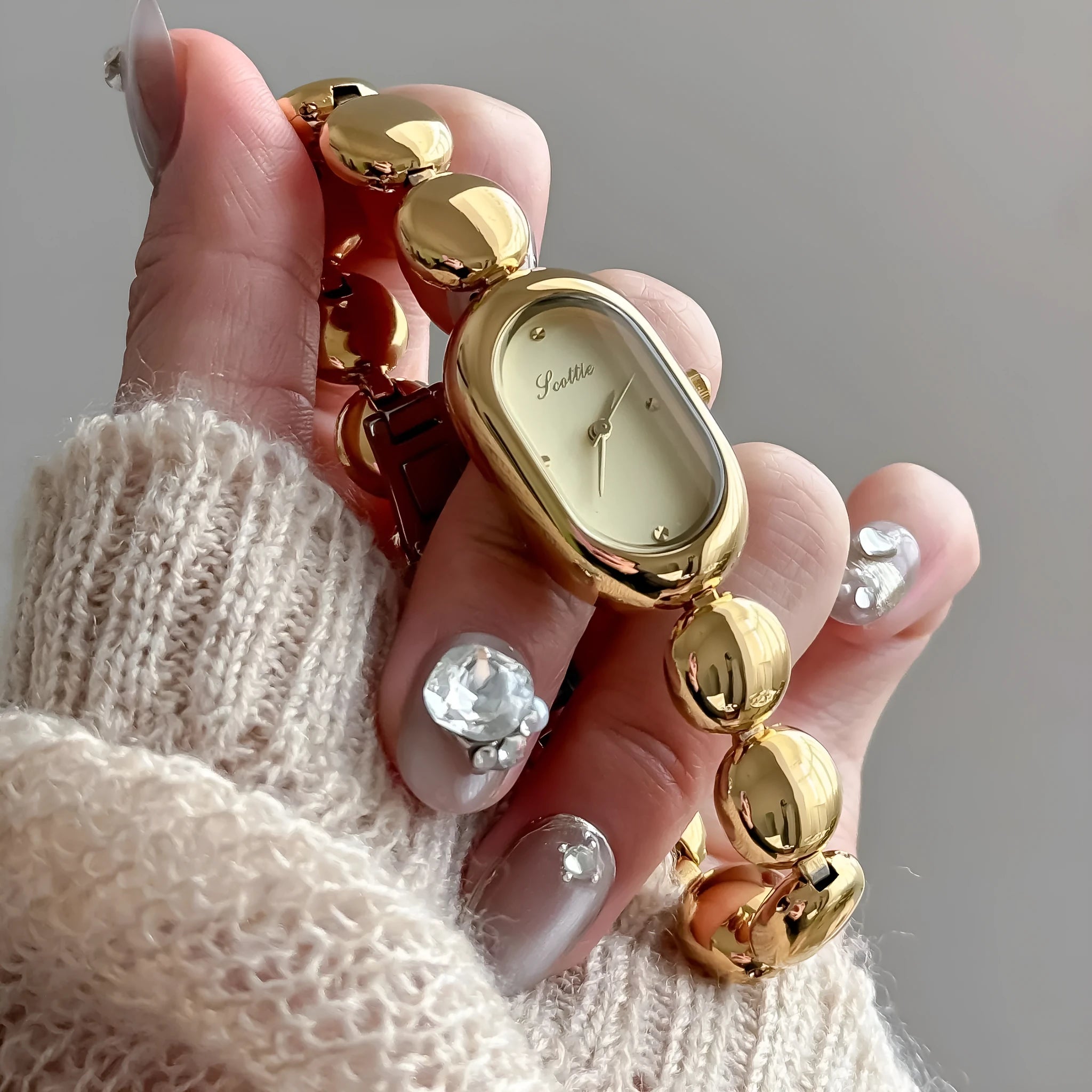 Women's oval fashion watch with bracelet strap in one of seven colour options.
