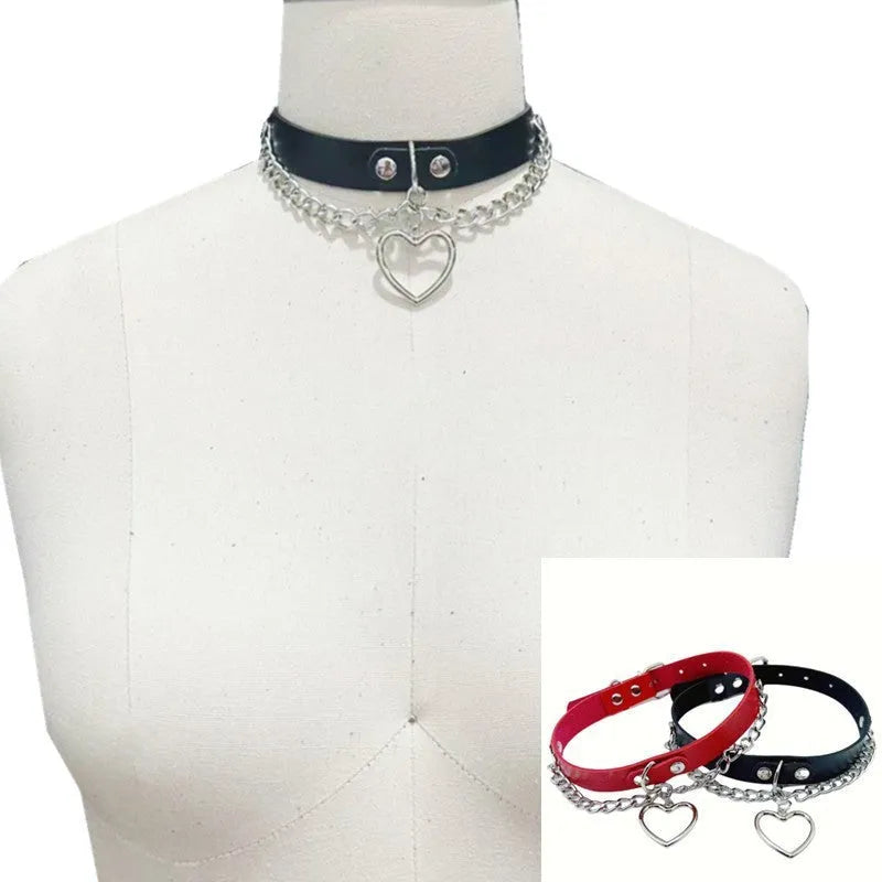 Heart-shaped leather collar clavicle necklace in black with chain link detail on woman's neck