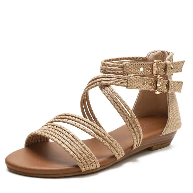 Women's open toe Roman sandals with cross strap, wedge heel, buckle, and back zipper in artificial leather.