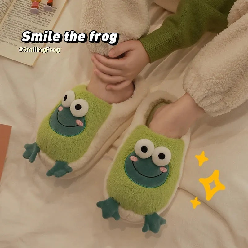 Green winter cotton slippers with coral fleece lining and cartoon frog pattern on a flat sole