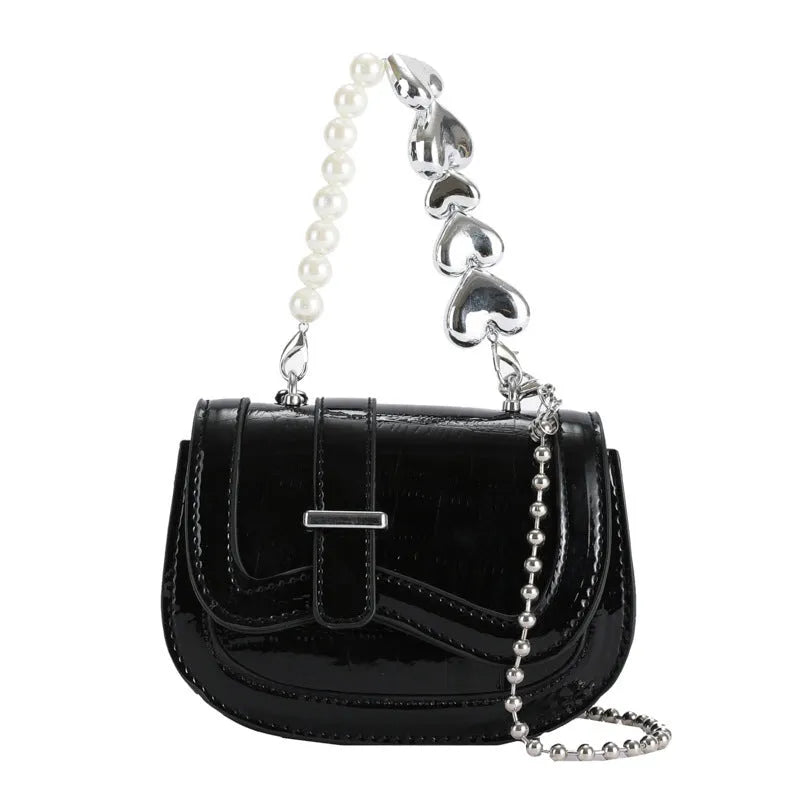 Women's PU leather mini tote crossbody bag in saddle silhouette with single shoulder strap