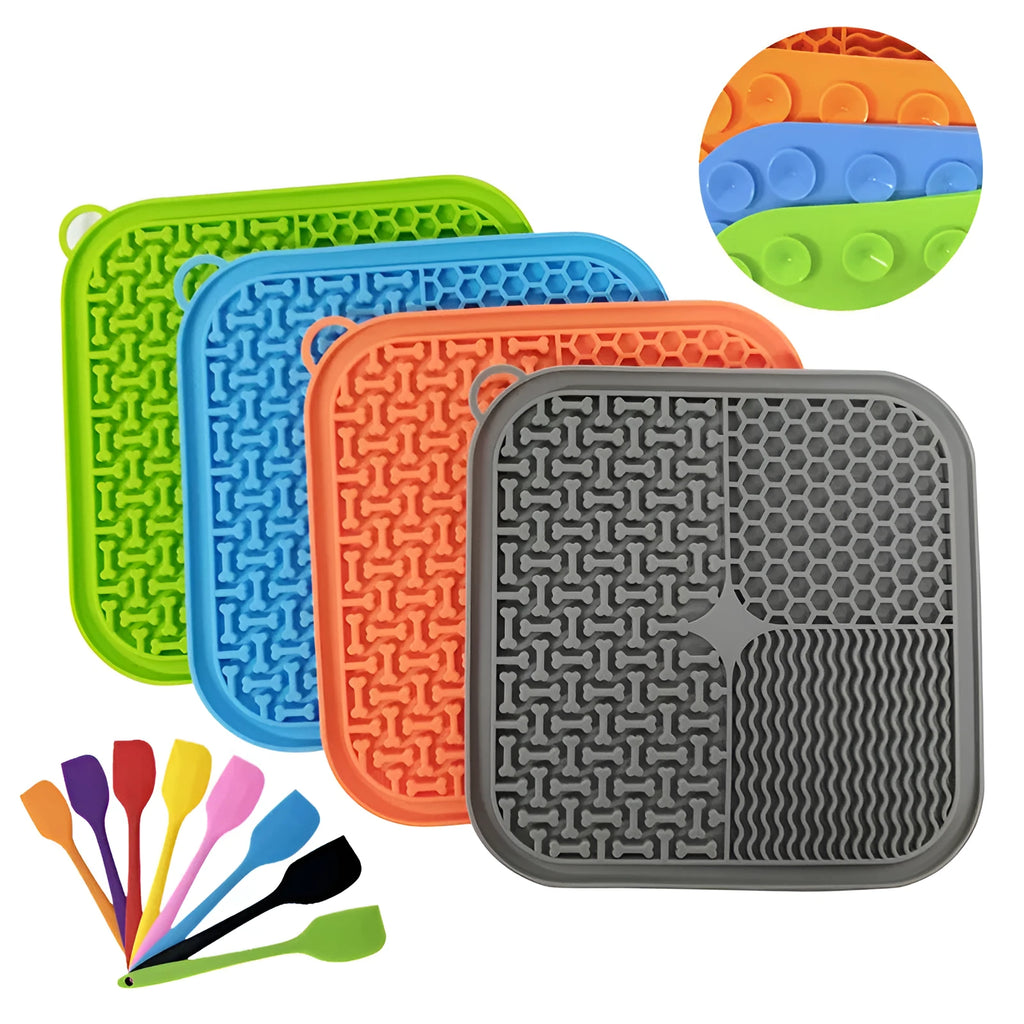 Fengrong silicone slow food bowl in sky blue on a non-slip surface with a scraper alongside