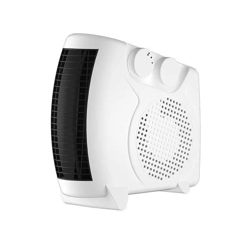 Compact white electric desktop heater with ventilation grille on a desk.
