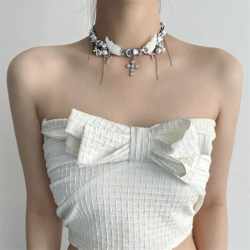 Silver zinc alloy star wings cross necklace on a clavicle chain with electroplated finish