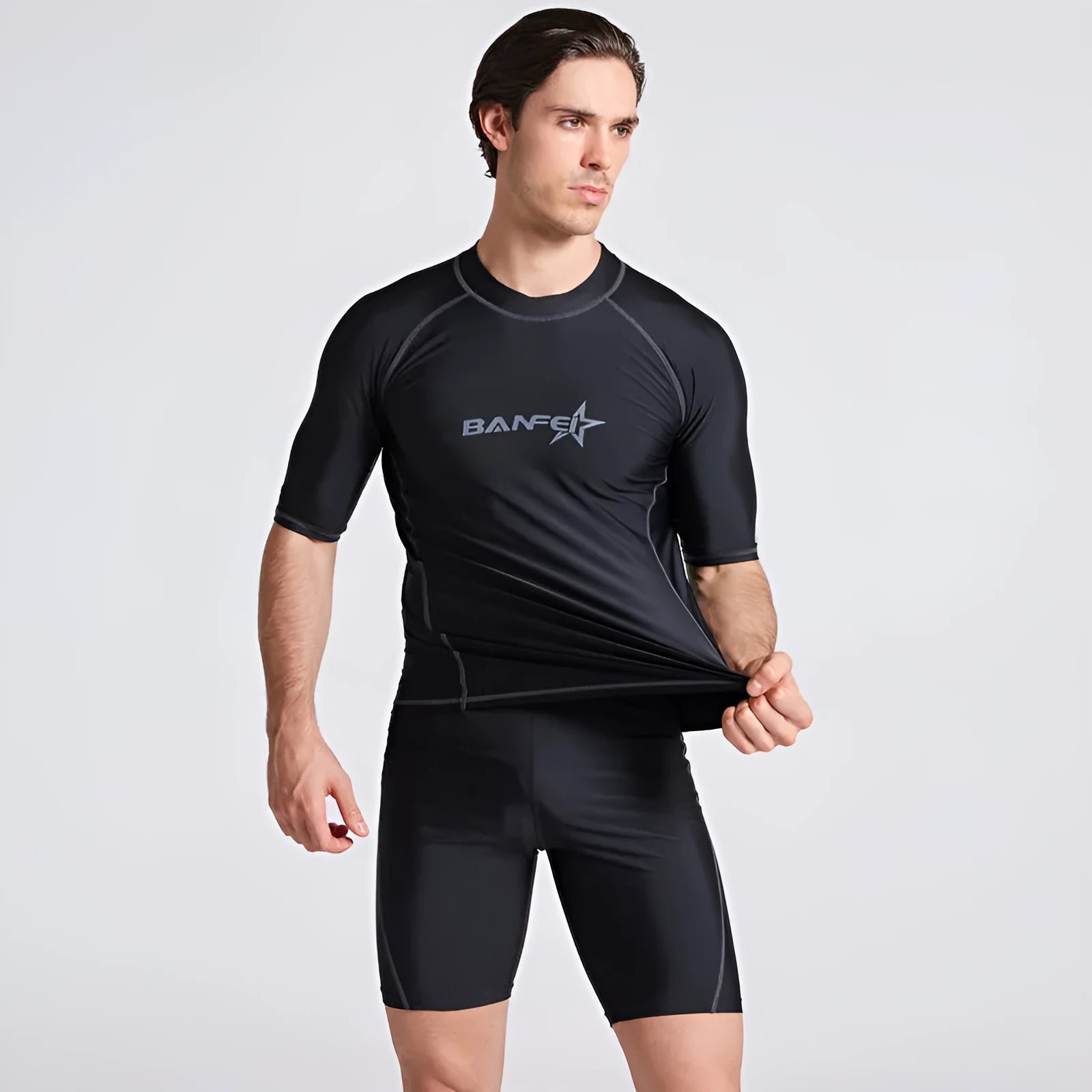 Men's quick-drying half sleeve nylon wetsuit top and pants for snorkelling and surfing