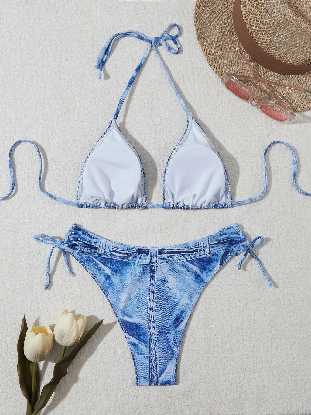 Denim blue women's bikini swimsuit with adjustable straps, shown as a complete set.