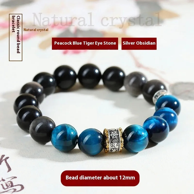 Peacock blue Tigereye stone bracelet with geometric ethnic design on wrist
