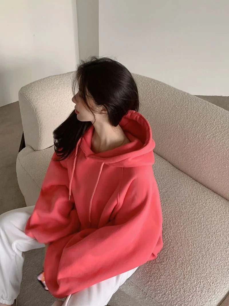 Watermelon red women's sleeveless hooded sweater made from loose-fitting Mulberry silk.