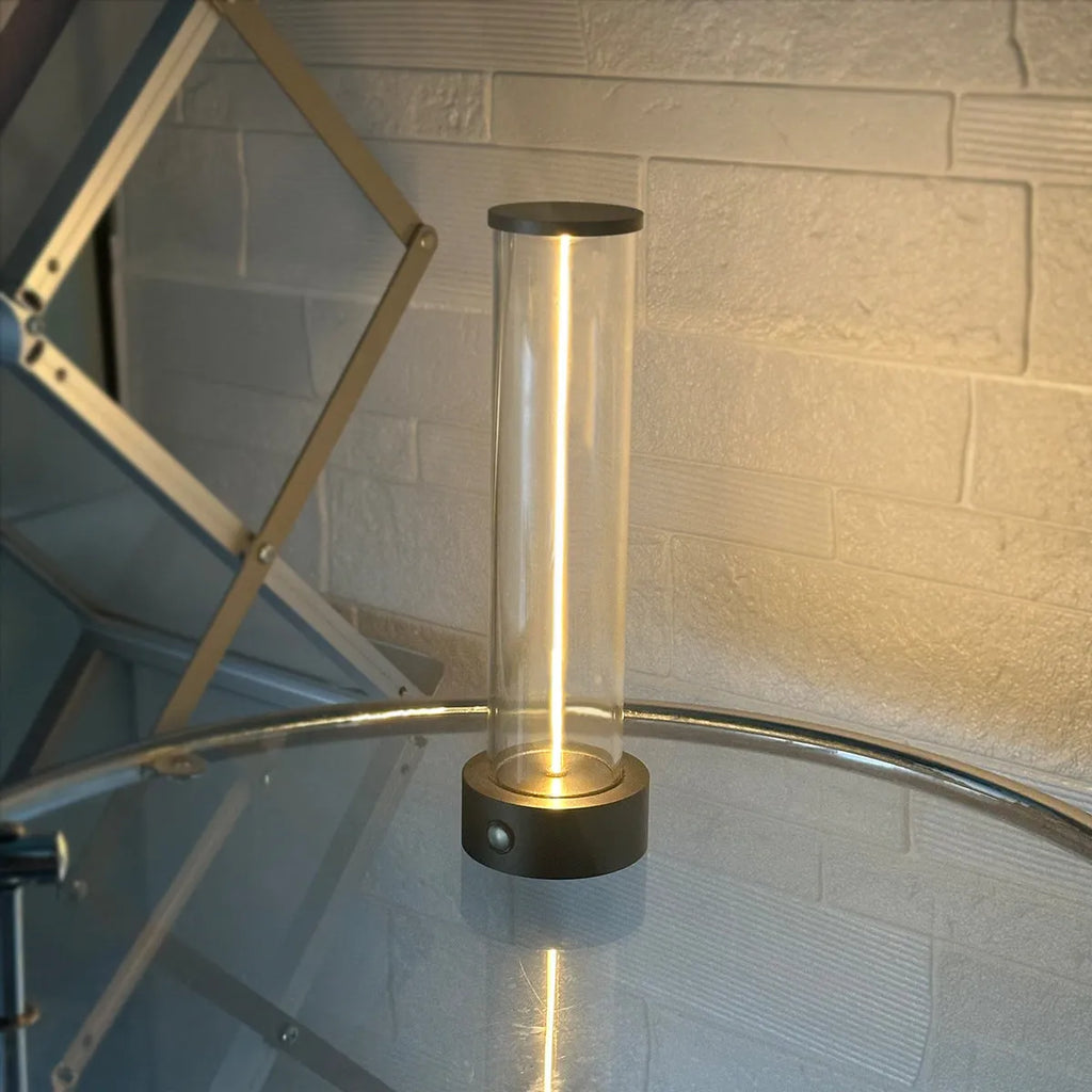 Modern linear glass USB LED night light strip with magnetic adhesive base.