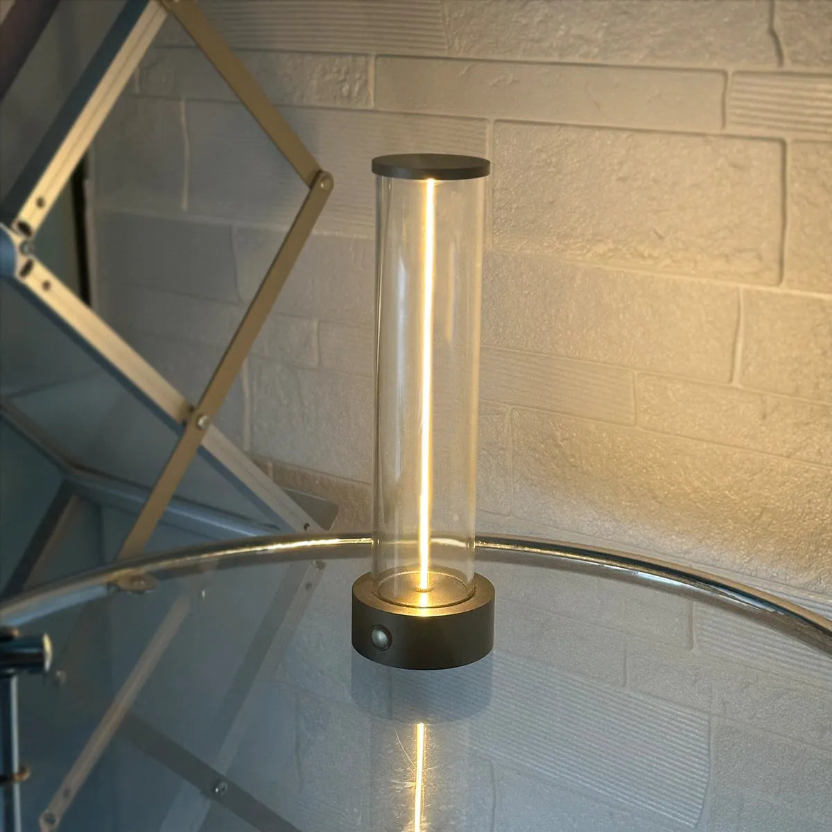Modern linear glass USB LED night light strip with magnetic adhesive base.