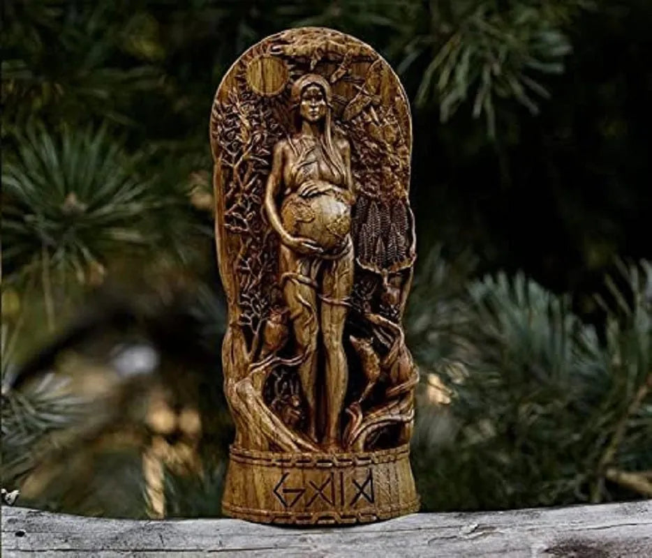 Detailed resin statue of a Greek goddess, 22cm tall, shown in one of three available colour finishes on a wooden surface.