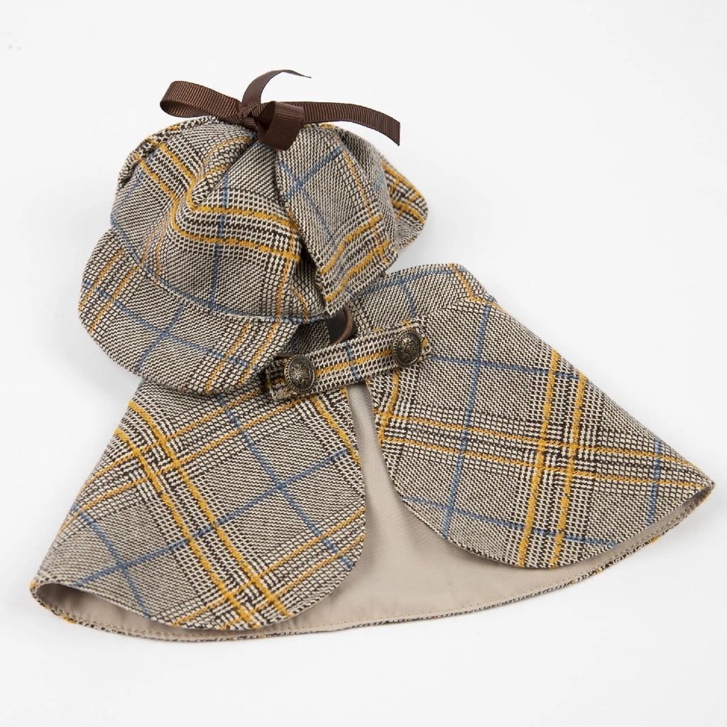 Camel coloured cotton pet cloak with an adjustable hat for a dog, showing the cloak design.