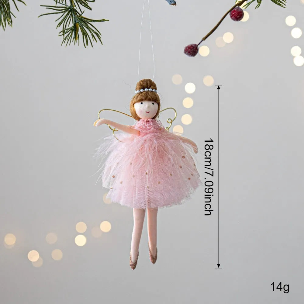 Pink and white cloth ballet girl angel plush doll pendant on a plain background.