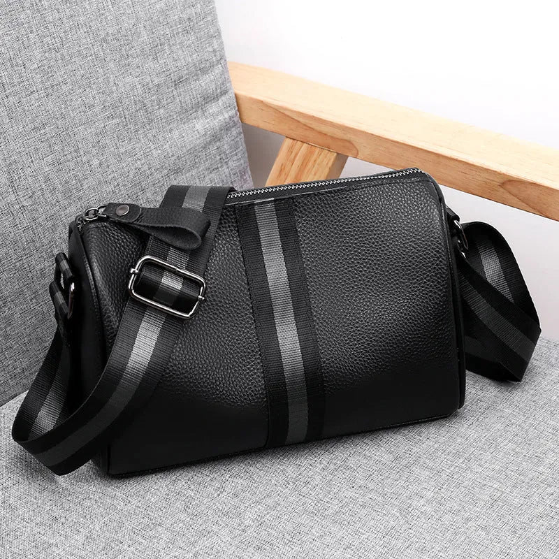Black genuine leather one-shoulder crossbody bag with adjustable strap