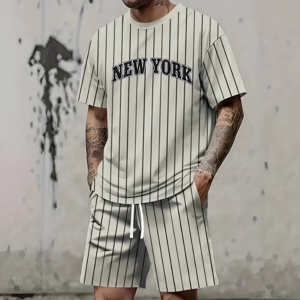 Men's grey 3D printed letter pattern sports suit consisting of a short sleeve top and matching shorts on a hanger